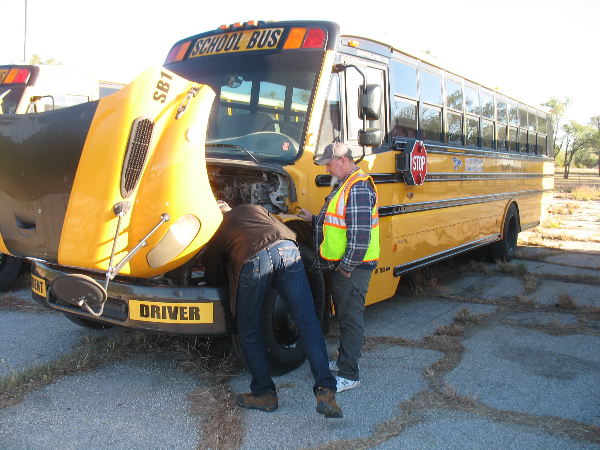 Donated bus from Durham School Services being used during a vehicle inspection training as part of Hutchinson’s CDL Training Program