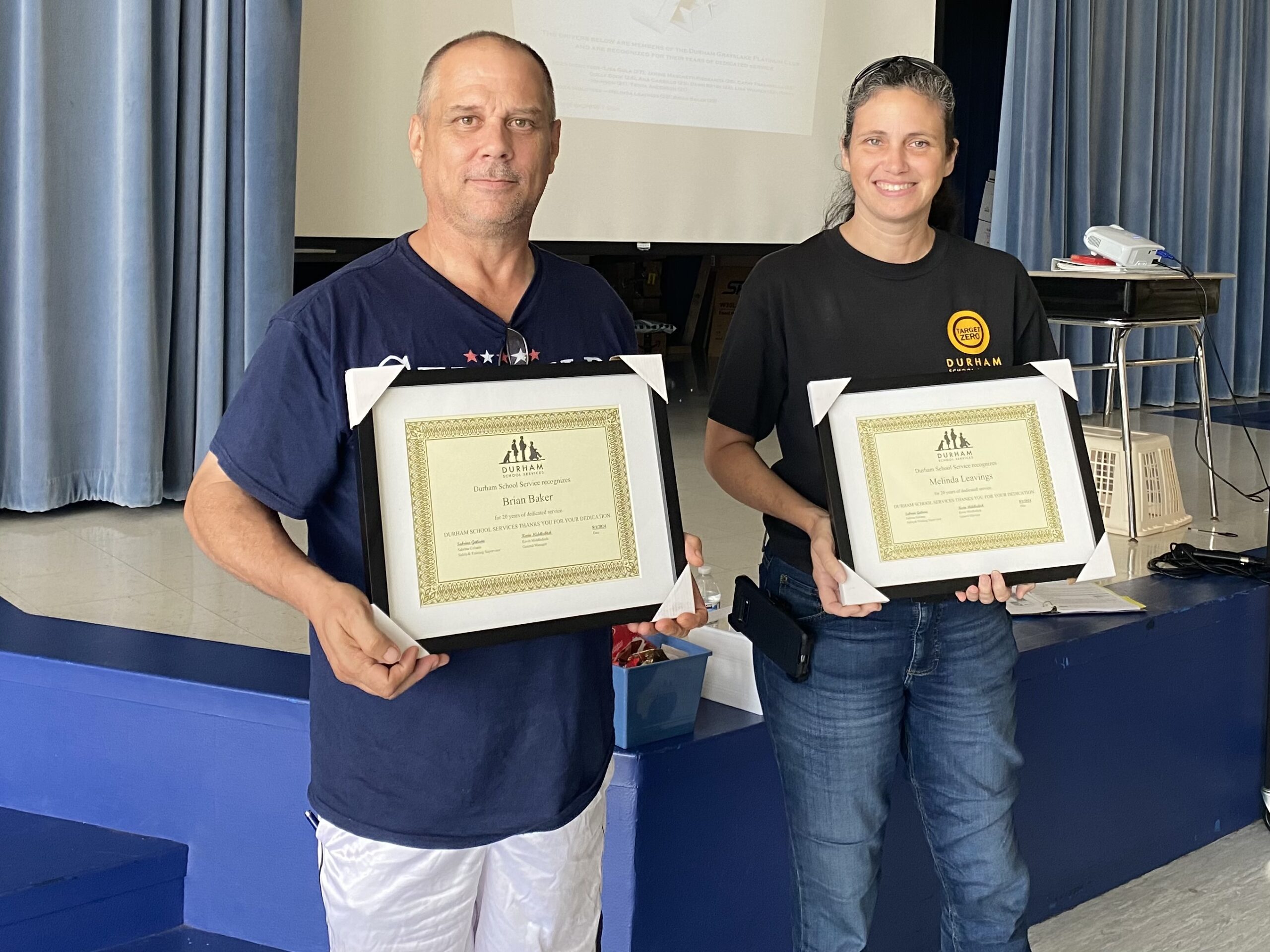 Brian Baker and Melinda Leavings with their award plaques